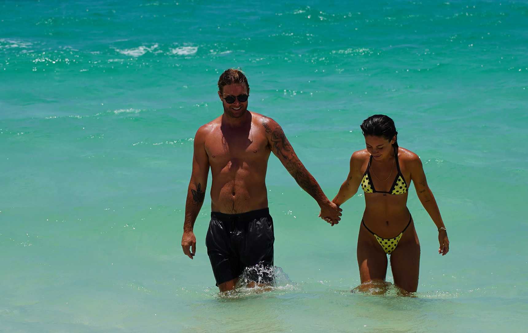 Relax poolside at WAHI, Hamilton Island
