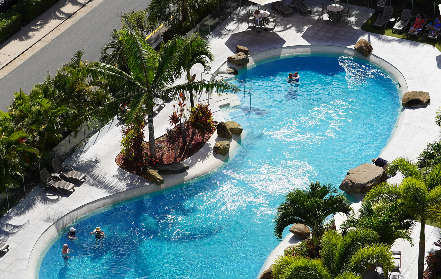 Relax poolside at WAHI, Hamilton Island